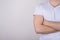 Cropped close up photo portrait of professional entrepreneur student wearing white simple t-shirt standing with crossed arms