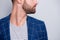 Cropped close up photo of serious confident man looking away standing side profile with beard bristle isolated grey
