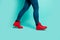 Cropped closeup profile photo of fit lady legs hips walking down abroad street foreign country wear stylish red shoes