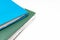 Cropped colorful folders with documents and bills on white table with copy space