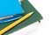 Cropped colorful folders with documents and bills and a yellow pencil on white table