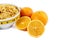 Cropped corn flakes bowl and orange fruit