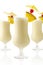 Cropped frame of Pina colada coconut cocktails with straw isolat