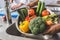 cropped image of african american chef washing vegetables