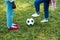 cropped image of african american couple playing football