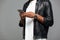 Cropped image of an afro american man in leather jacket