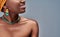 Cropped image of afro american woman on grey background