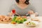 Cropped image of asian woman have breakfast