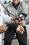 Cropped Image Of Chemist Checking Patient`s Blood Pressure