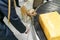 Cropped image of a drug detection labrador dog at the airport searching drugs in the luggages. Horizontal view