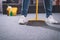 cropped image of man standing with broom