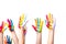 cropped image of schoolchildren showing painted hands with smiley icons