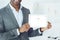 cropped image of smiling african american man showing tablet with loaded google page