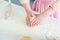 cropped image of woman kneading dough