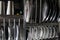 Cropped, partial and close view of kitchen utensils all together display on a residential kitchen rack.