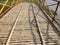 Cropped, partial and closeup view of bamboo made pathway or bridge