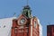 Cropped and partial view of famous `S.S. Hog Market` clock tower, at Esplanade East, Kolkata, West Bengal 700069.