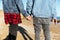 Cropped photo of african loving couple walking outdoors