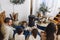 Cropped photo of big family wearing warm woolen socks resting by fireplace