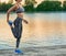 Cropped photo of girl making exercises on fresh air.