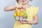 Cropped photo of girl with a shopping basket filled with Easter decorations