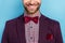Cropped photo of handsome cheerful vogue glamour style male go on date party isolated on blue color background
