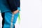 Cropped photo of a man in a colorful tracksuit. The concept of childhood, fashion, advertising and sports