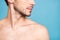 Cropped photo of naked attractive handsome man with face unshaven isolated over pastel blue color background