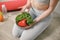 Cropped photo of woman with lots of healthy fresh vegetables on a plate