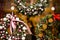 cropped photo of wreaths made of natural spruce branches decorated with toys and dried fruits