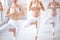 Cropped pregnant yoga women working out in studio doing prenatal Tree posture, Vrksasana yoga pose