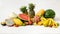 Cropped shot of assortment of exotic fruits and copy space on white background