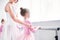 cropped shot of ballet teacher exercising with kids