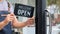 Cropped shot of Business owners hold an Open sign to provide service