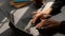 Cropped shot of businesswomen typing on blank screen tablet in modern dark office