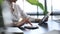 Cropped shot businesswomen using a calculator and digital tablet at office desk. Financial and investment concept