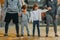 Cropped shot of family with kids holding hands and standing in a row