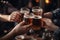 cropped shot of friends clinking glasses with beer at bar counter, Group of peoples holding Beer on glass, AI Generated