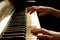 Cropped shot of a little girl playing the piano.