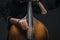 cropped shot of man playing contrabass