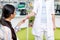 cropped shot of pharmacist giving pills to customer