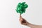 cropped shot of woman holding handmade tree in hand, recycle concept