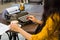 Cropped shot of a writer`s hands typing on retro typewriter