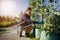 Cropped shot of a young male gardener while clipping or prune the tree in horticulture