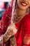 cropped view of cheerful indian bride