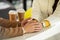 Cropped view of loving couple holding hands at table