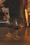 Cropped view of man pouring red wine in the glasse at his kitchen