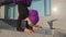 Cropped view strong active muslim girl athlete yogi woman in purple hijab standing on arms in city pavement on street