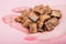 Cropped view of woman with handful of brown sugar cubes