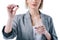 cropped view of woman holding glass of water and activated carbon tablet,